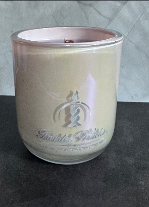 Refreshing Waters 10oz artisan candle in a blush pink glass tumbler with a wood wick and white Twisted Wicks logo